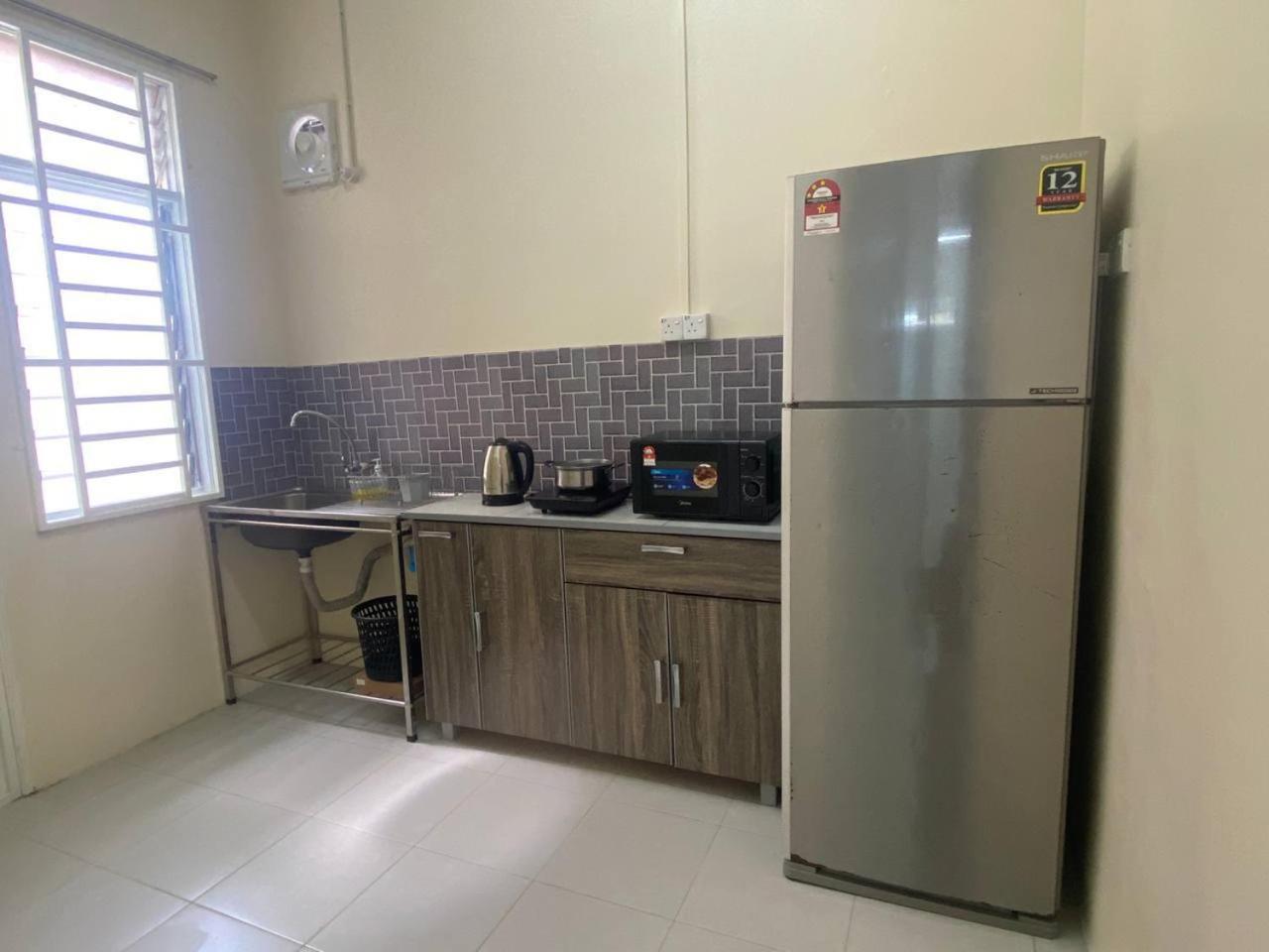 Homestay Rumoh Mok Jitra Bagian luar foto
